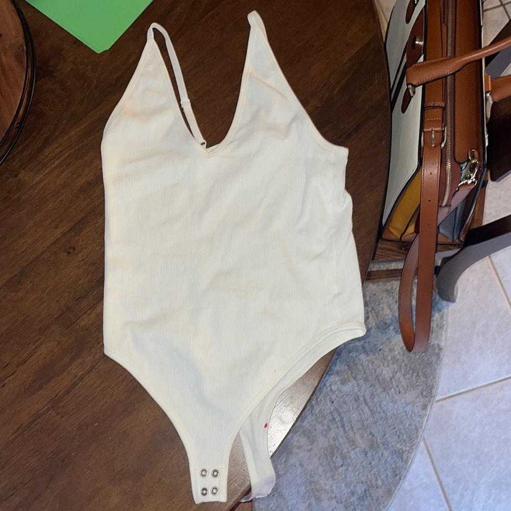 Brand New Garage Bodysuit